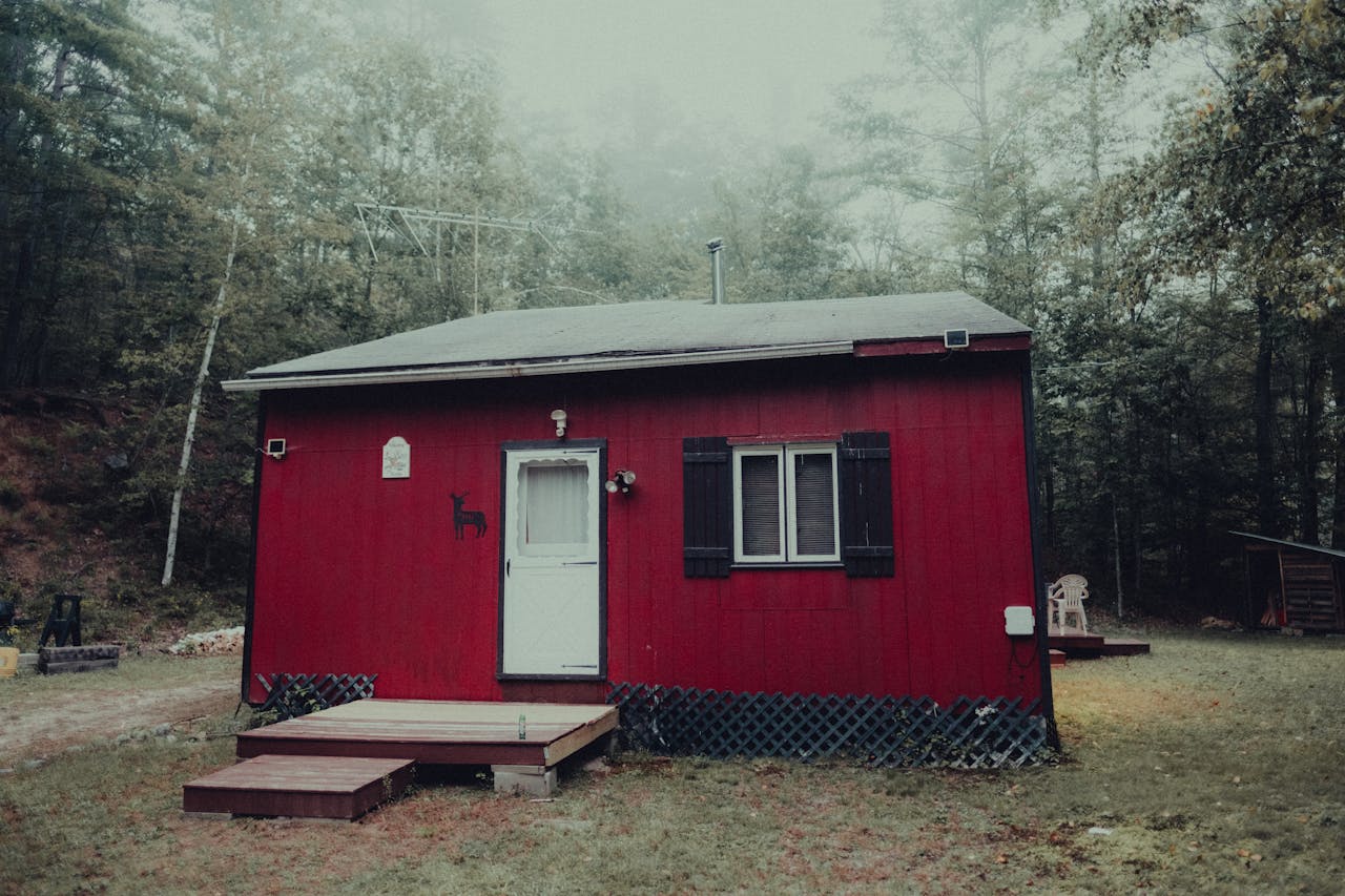 Modern composting toilet installed in a clean off-grid cabin bathroom