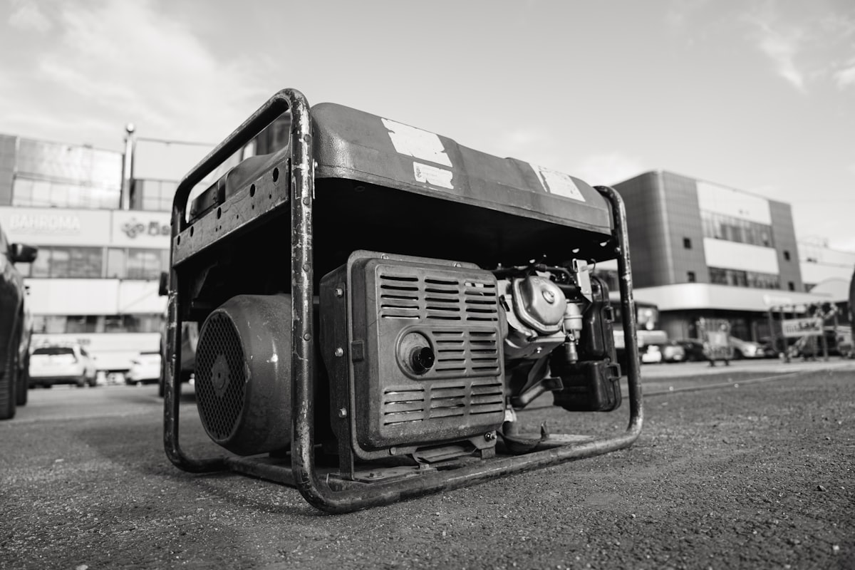 Portable generator running outside a home during a power outage